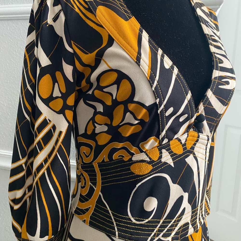 Chic 70’s-esque modern dress so flattering; black, cream, pumpkin print; Small